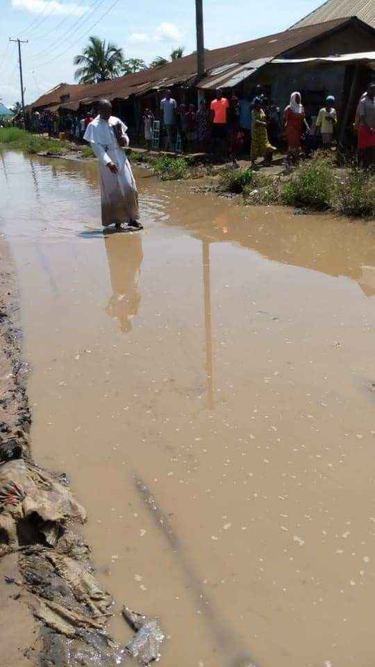 Reverend Father David Okechukwu Leads Residents To Protest Over Bad Roads In Abia [Photos] 5