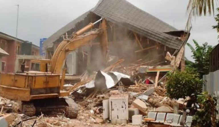Enugu Government Demolishes House Of Man Who Pulled Down Airport Fence [Photos] 3