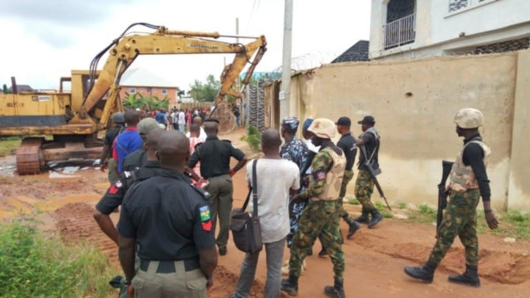 Enugu Government Demolishes House Of Man Who Pulled Down Airport Fence [Photos] 4