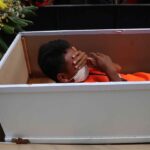 Caught not wearing a face mask in Jakarta? You'll be put in a coffin as punishment - PHOTOS 2