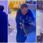 Burna Boy’s Grandma Dances And Sings His Praises As He Gifts Her Designer Bag [Video]
