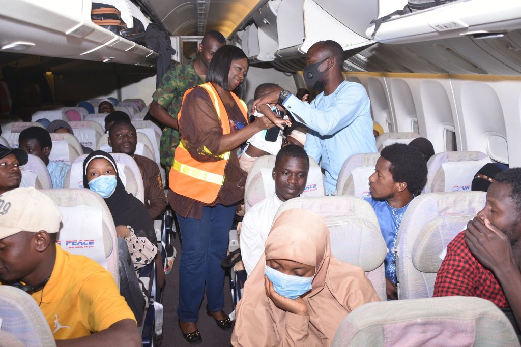 First Batch Of 376 Nigerians Evacuated From Sudan Arrive Abuja [Photos]