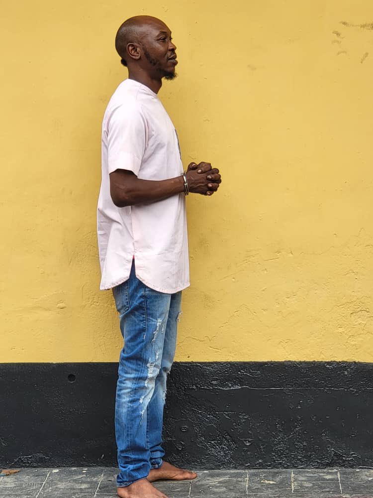 Seun Kuti Handcuffed And Paraded After He Surrendered To Police [Photos/Video]