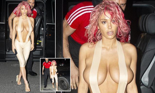 Bianca Censori Goes Topless In Suspenders For Dinner With Kanye West [Photos]