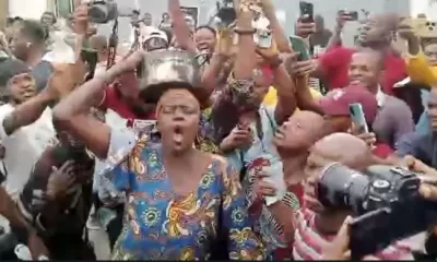 "Ebi O, Ebi O (Hunger)" - Woman Joins Protest Carrying Empty Pot In Lagos [Video]