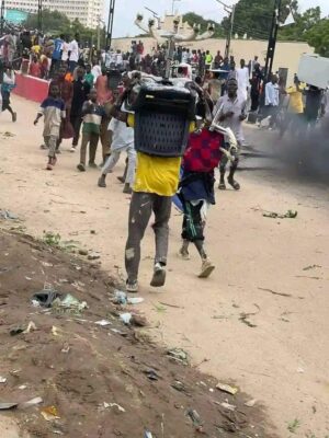 #EndBadGovernance: Hoodlums Hijack Kano Protest, Loot Shops and Offices [Photos]