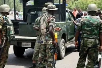 Military Officers Invade Ikeja Electric Office, 'Assault Staff, Steal Laptops, Phones' [Video]