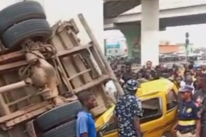 Driver Badly Injured After Truck Falls Off Bridge In Lagos [Photos]