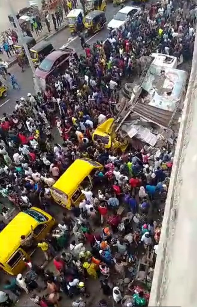 Driver Badly Injured After Truck Falls Off Bridge In Lagos [Photos]