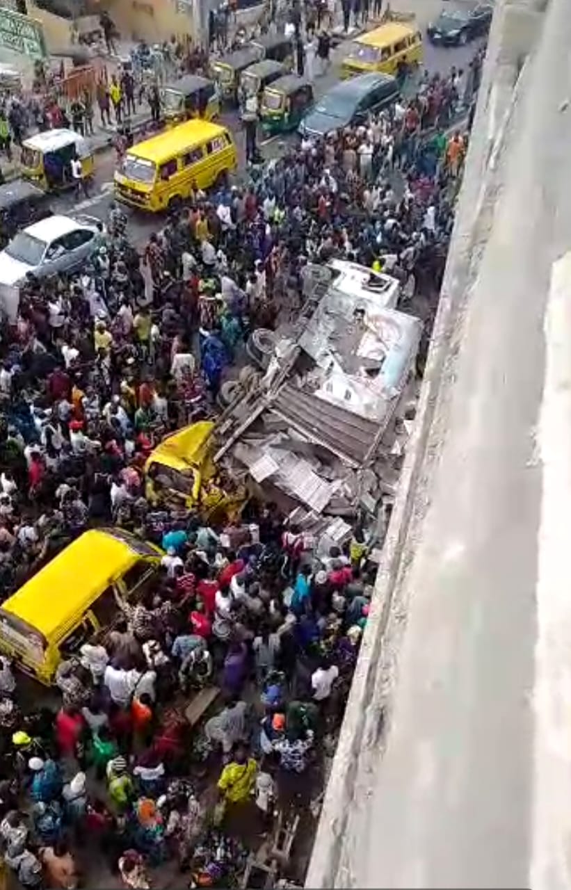 Driver Badly Injured After Truck Falls Off Bridge In Lagos [Photos]