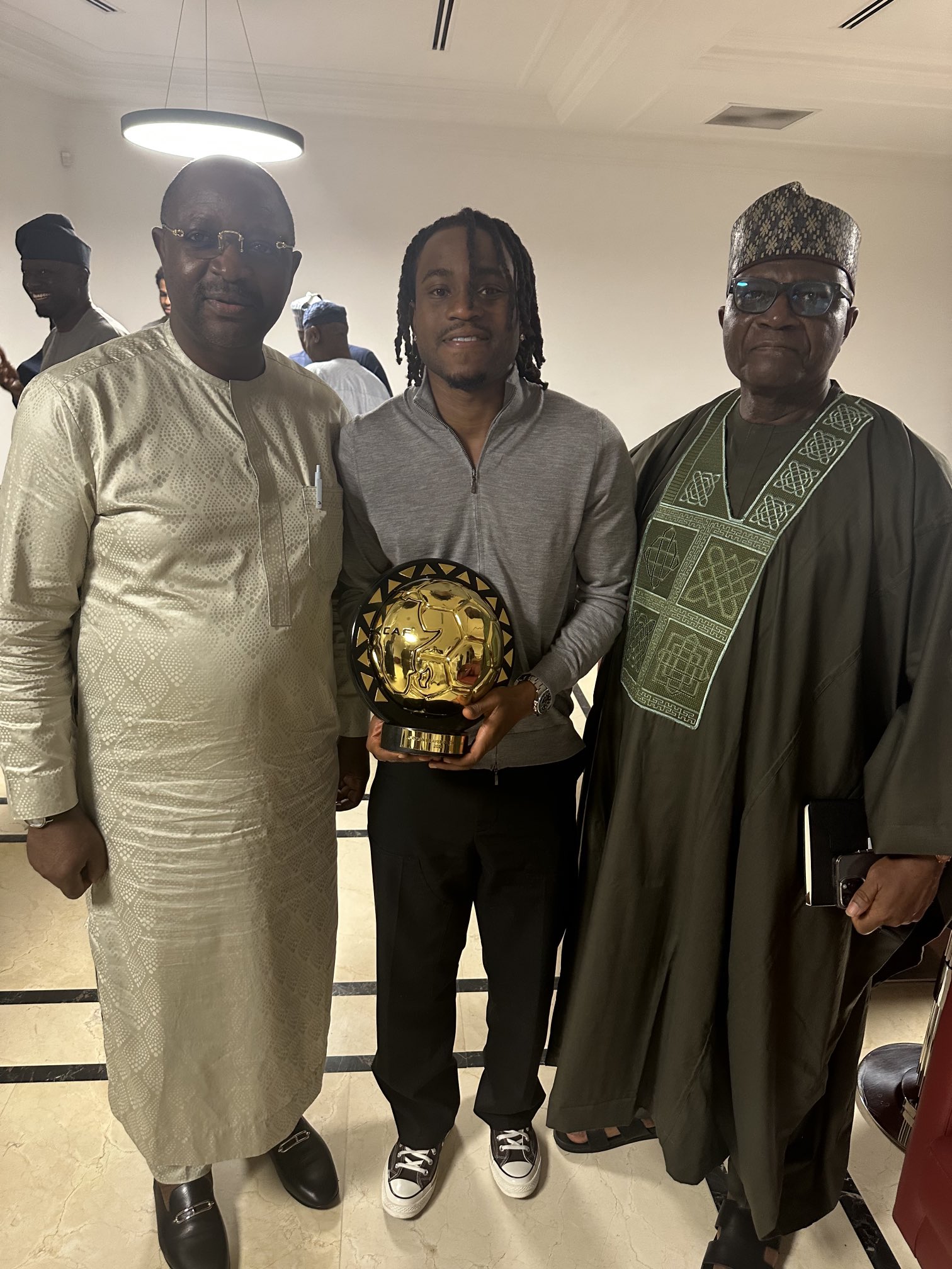 Lookman Presents CAF Footballer Of The Year Award To Tinubu In Lagos [Photos]