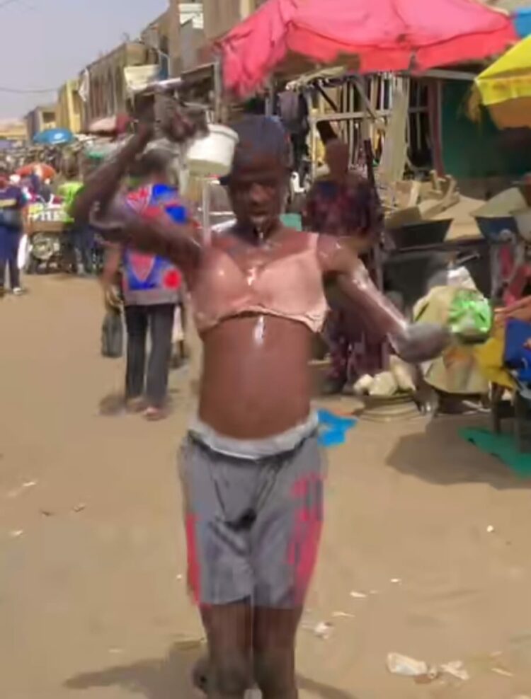Kano TikToker, Tsulange Remanded In Prison For Bathing On Street In Women’s Bra