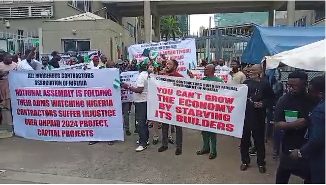 Nigerian Contractors Protest Unpaid Contracts, Block Finance Ministry Gate In Abuja [Video]