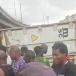 Police Officer, One Other Killed As Container-Laden Truck Crushes Tricycle In Lagos