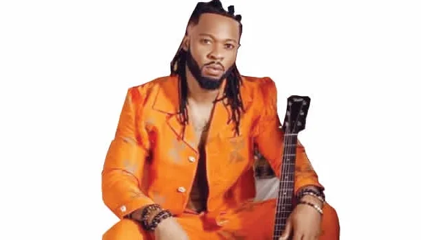 Singer Flavour Shares Business Card Showing His Previous Job Before Becoming A Star