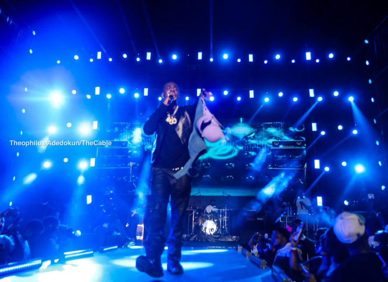 Female Fans Throw Bras At Young John During His Easter Concert In Abuja [Video]