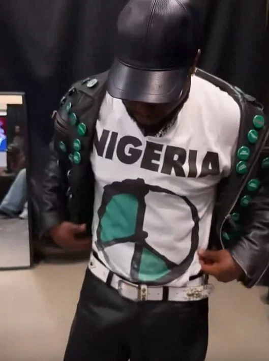 Davido Wears Jacket Bearing Names Of Abducted Oyo Pupils, Teachers At World Cup Concert