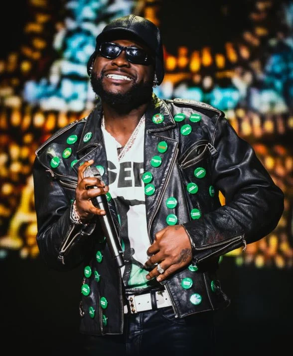 Davido Wears Jacket Bearing Names Of Abducted Oyo Pupils, Teachers At World Cup Concert